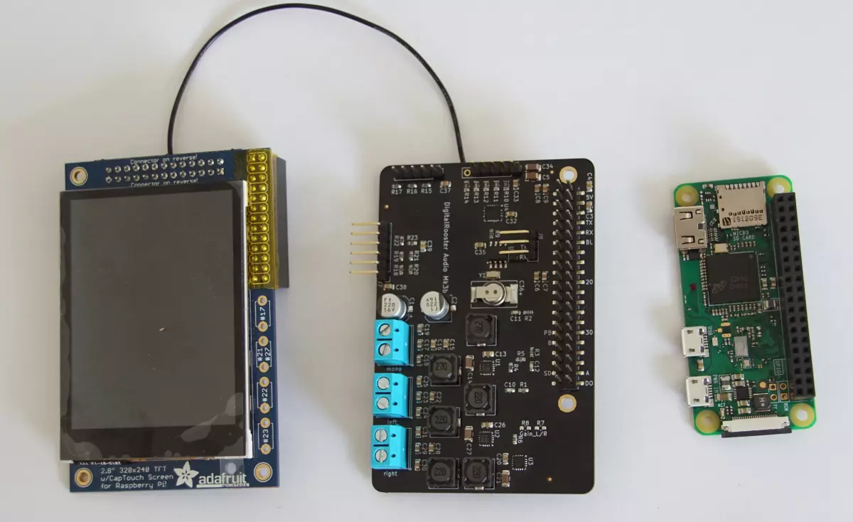 The parts ready for assembly PiTFT, digitalrooster-mk3b and RaspberryPi before assembly